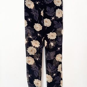 Ganni designer floral pants with see through legs. size medium good pre-owned